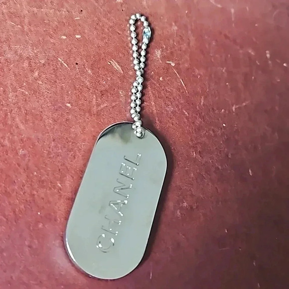 CHANEL Accessories - Chanel gold foil inlaid green dog tag